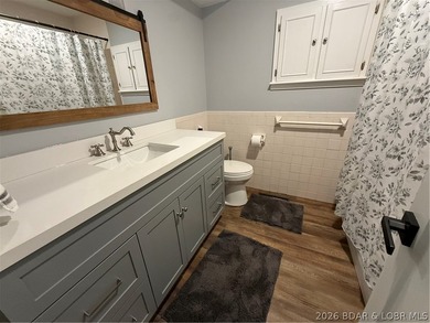This beautifully updated 3-bedroom, 1.5-bathroom home offers a - photo 9