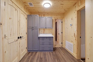 Lake living at its finest! Total custom remodel has all the - photo 20
