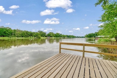 Lake living at its finest! Total custom remodel has all the - photo 31
