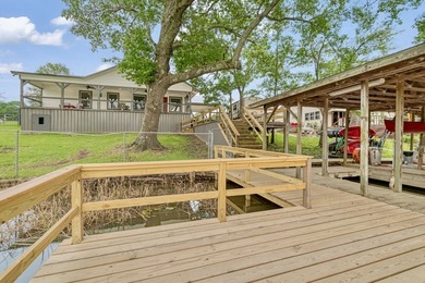 Lake living at its finest! Total custom remodel has all the - photo 32