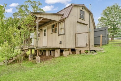 Lake living at its finest! Total custom remodel has all the - photo 33