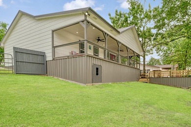 Lake living at its finest! Total custom remodel has all the - photo 34