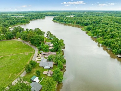Lake living at its finest! Total custom remodel has all the - photo 37