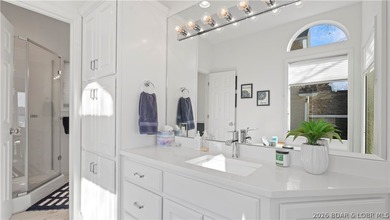 Experience the ultimate Lake of the Ozarks lifestyle in this - photo 8