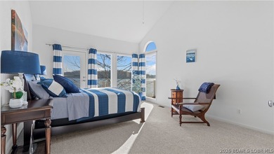 Experience the ultimate Lake of the Ozarks lifestyle in this - photo 10