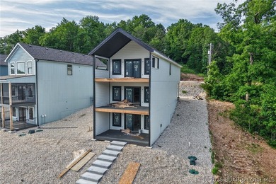 BRAND NEW LAKE HOME AND DOCK!!! The perfect blend of modern - photo 2