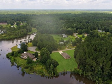 CUTE AS A BUTTON COTTAGE STYLE WATERFRONT home with large front - photo 1