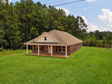 CUTE AS A BUTTON COTTAGE STYLE WATERFRONT home with large front - photo 2