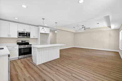CUTE AS A BUTTON COTTAGE STYLE WATERFRONT home with large front - photo 6