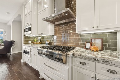 Nestled on a peaceful cul-de-sac street, this exceptional