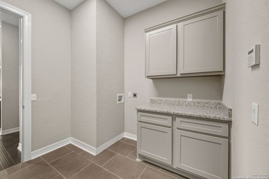 Nestled on a peaceful cul-de-sac street, this exceptional