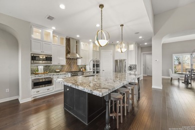 Nestled on a peaceful cul-de-sac street, this exceptional