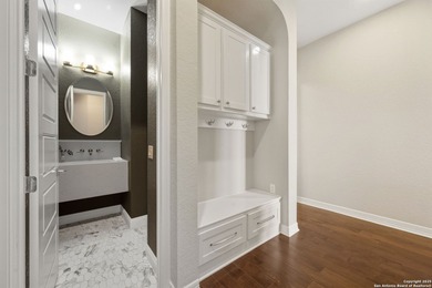 Nestled on a peaceful cul-de-sac street, this exceptional