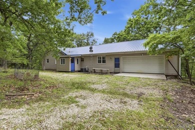 Discover the perfect blend of privacy, space, and lake living on - photo 1