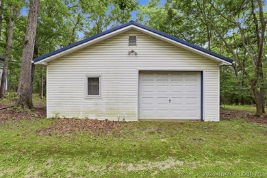 Discover the perfect blend of privacy, space, and lake living on - photo 4