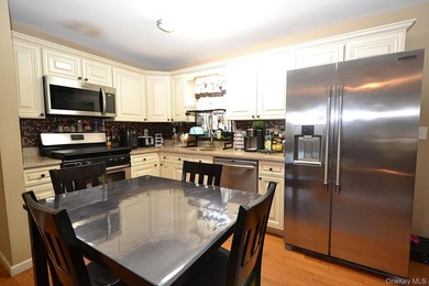 Rare find! This meticulously maintained 3-bedroom home combines - photo 7