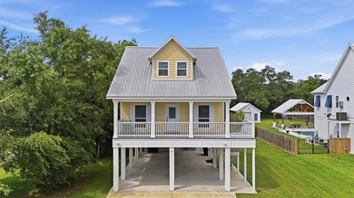 t 1/2 mile from the beach, this adorable 4-year-young cottage - photo 1