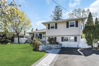 Mint expanded Center Hall Split in the desirable Village of - photo 3