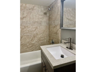 Welcome home! This sharp, completely remodeled studio in heart