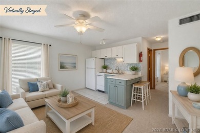 AFFORDABLE LAKEFRONT, Low HOA fees, 1 bedroom, 1 bath end-unit - photo 2