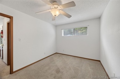 AFFORDABLE LAKEFRONT, Low HOA fees, 1 bedroom, 1 bath end-unit - photo 8