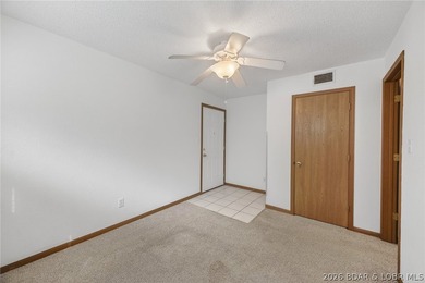 AFFORDABLE LAKEFRONT, Low HOA fees, 1 bedroom, 1 bath end-unit - photo 9