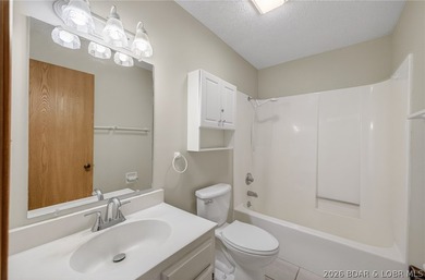 AFFORDABLE LAKEFRONT, Low HOA fees, 1 bedroom, 1 bath end-unit - photo 10
