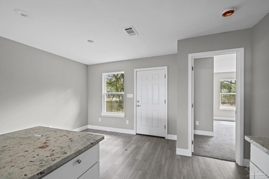 Completed in 2025, this brand-new construction home offers 3 - photo 12