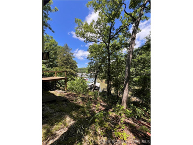 Rare opportunity to own a private waterfront retreat with - photo 8