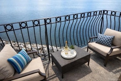 Wake up to breathtaking, unobstructed waterfront views from your - photo 2