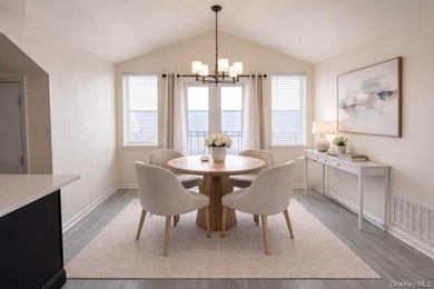 Wake up to breathtaking, unobstructed waterfront views from your - photo 6