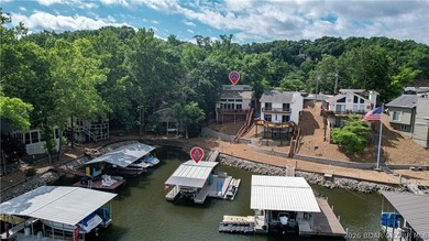Lake living doesn't get much better than this! Nestled in a - photo 3