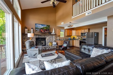 Lake living doesn't get much better than this! Nestled in a - photo 4