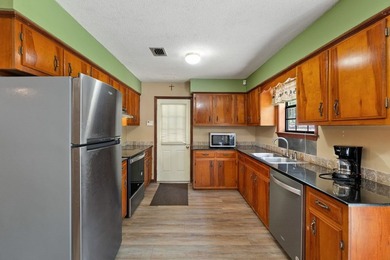 Location location location!!! Charming 4BR/2BA country home - photo 6