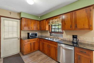 Location location location!!! Charming 4BR/2BA country home - photo 7