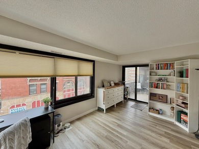 This bright and generously sized corner unit offers an open - photo 5