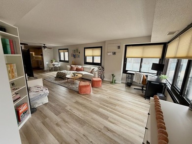 This bright and generously sized corner unit offers an open - photo 6