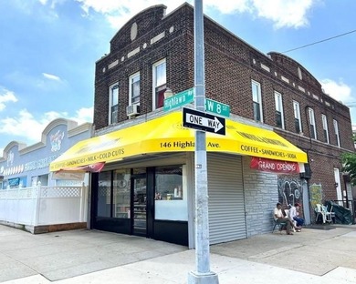 Mixed use brick building with 4 commercial Stores and 2 family - photo 2