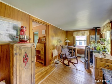 Charming 2-bedroom ranch-style home on a lovely lake offers a - photo 10
