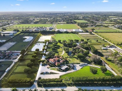 Stunning 21 acre Equestrian Compound located in the heart of - photo 2