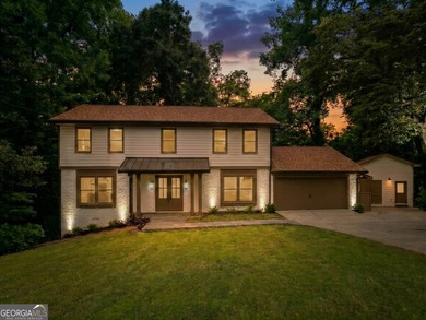 Stylish, low-maintenance Brookhaven living inside gated Ashford - photo 1