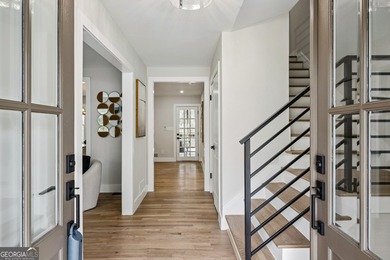 Stylish, low-maintenance Brookhaven living inside gated Ashford - photo 2