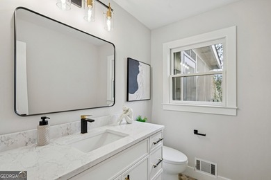 Stylish, low-maintenance Brookhaven living inside gated Ashford - photo 10