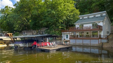 700+ Feet of Lakefront - 3.3 +/- Acres - Cove Protection - - photo 1