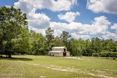 Tucked away on nearly 10 beautiful acres in Saucier, this - photo 13