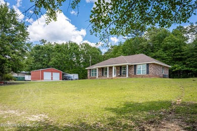 Tucked away on nearly 10 beautiful acres in Saucier, this - photo 15