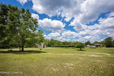 Tucked away on nearly 10 beautiful acres in Saucier, this - photo 16