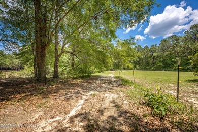 Tucked away on nearly 10 beautiful acres in Saucier, this - photo 33