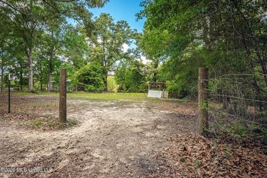 Tucked away on nearly 10 beautiful acres in Saucier, this - photo 41