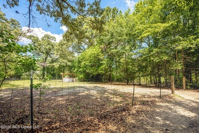 Tucked away on nearly 10 beautiful acres in Saucier, this - photo 44